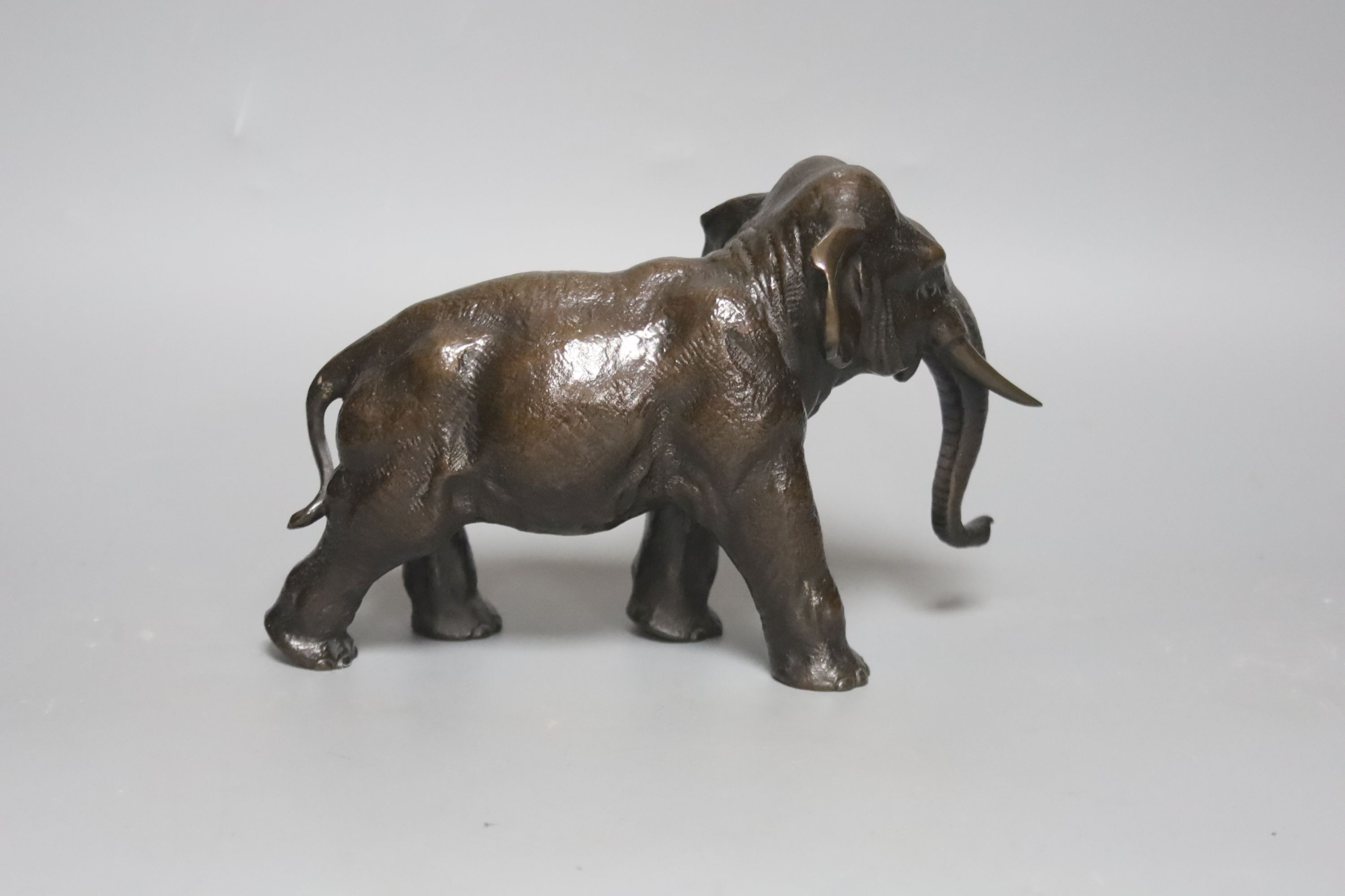 A Japanese Meiji period bronze elephant, 22cm